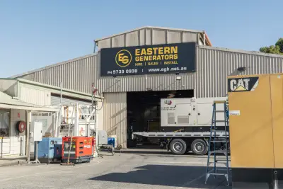 egh-pic-large-gray-building-yellow-black-sign-3x2-2560x1707.webp