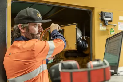 egh-pic-man-orange-safety-vest-black-cap-3x2-2560x1707.webp
