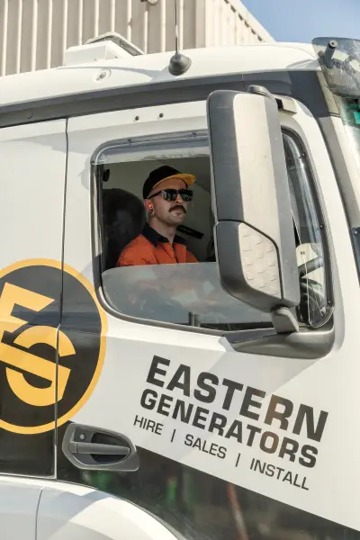 egh-pic-man-orange-shirt-baseball-cap-driver-2x3-1707x2560.webp