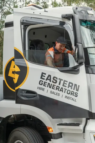 egh-pic-man-orange-shirt-dark-cap-driver-2x3-1707x2560.webp