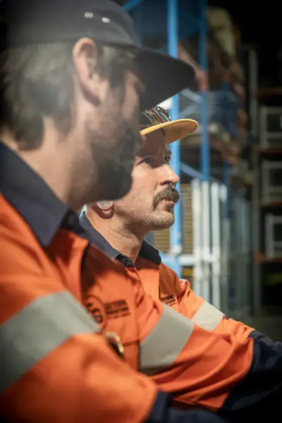 egh-pic-men-orange-safety-vests-hats-facing-2x3-1707x2560.webp