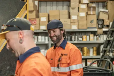 egh-pic-men-orange-shirts-baseball-caps-warehouse-3x2-2560x1707.webp