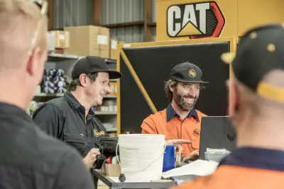 egh-pic-men-work-attire-warehouse-cat-sign-3x2-2560x1707.webp