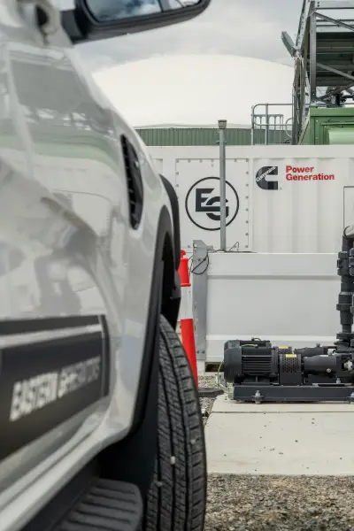 egh-pic-white-pickup-truck-parked-container-labeled-2x3-1707x2560.webp