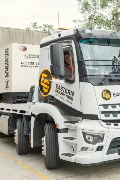 egh-pic-white-truck-yellow-black-logo-words-2x3-1707x2560.webp