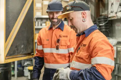egh-pic-workers-orange-shirts-hats-one-holding-3x2-2560x1707.webp