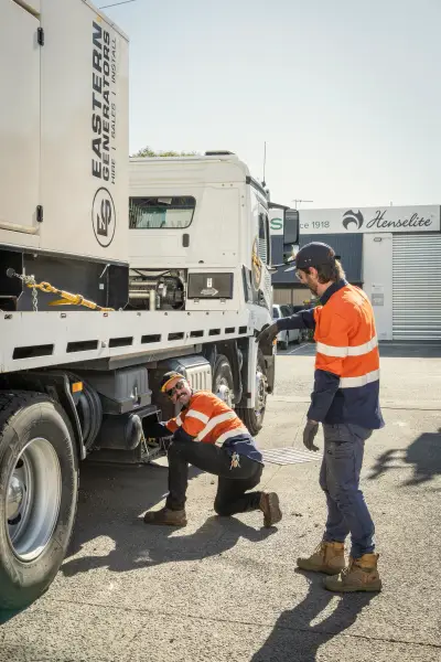 egh-pic-workers-orange-vests-hard-hats-attend-2x3-1707x2560.webp