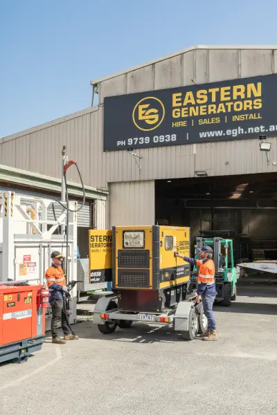 egh-pic-workers-orange-vests-yellow-black-generator-2x3-1707x2560.webp
